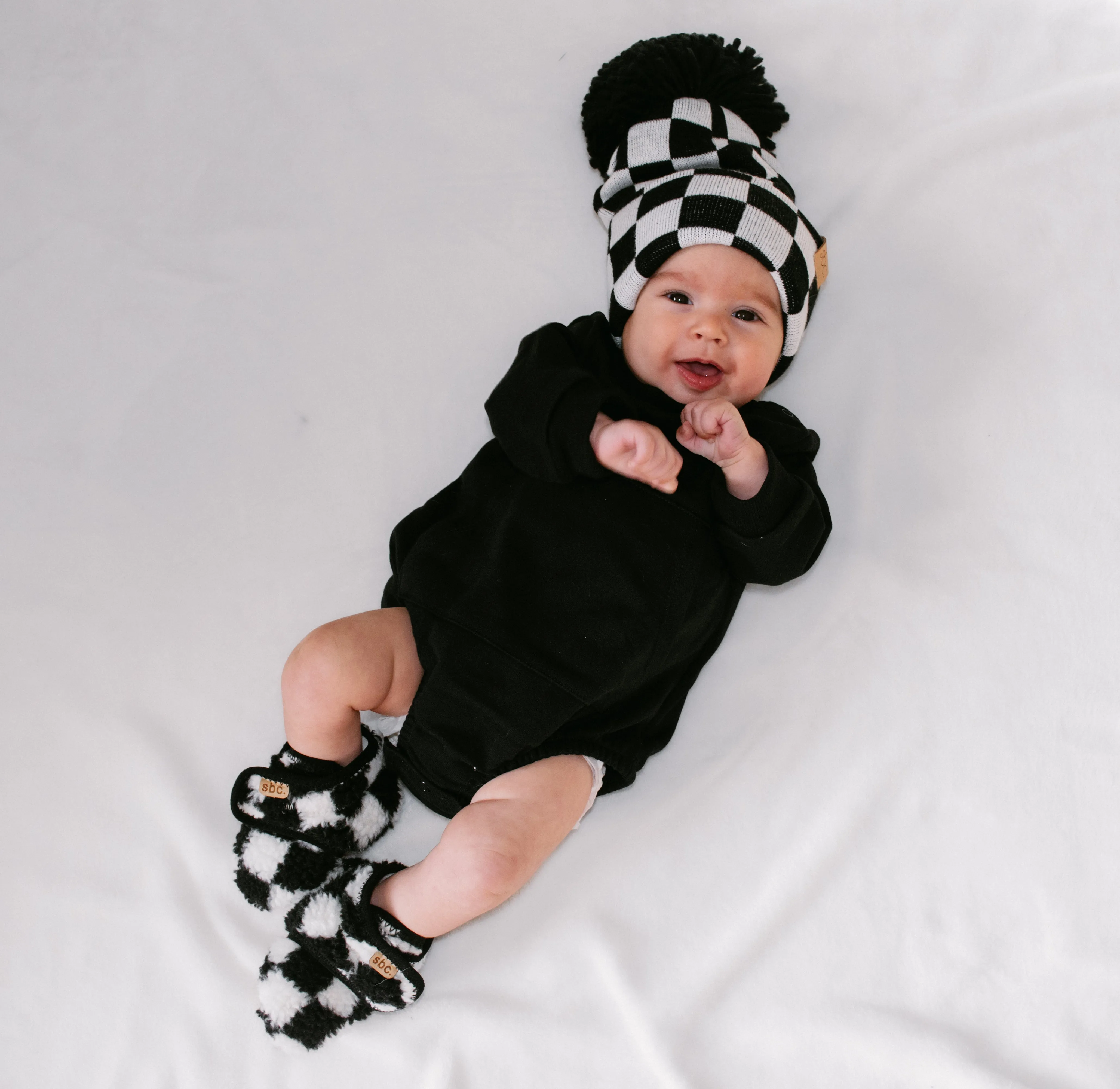 SHORE BABY Sherpa Bootie – Black + White Checkered | Shop Now