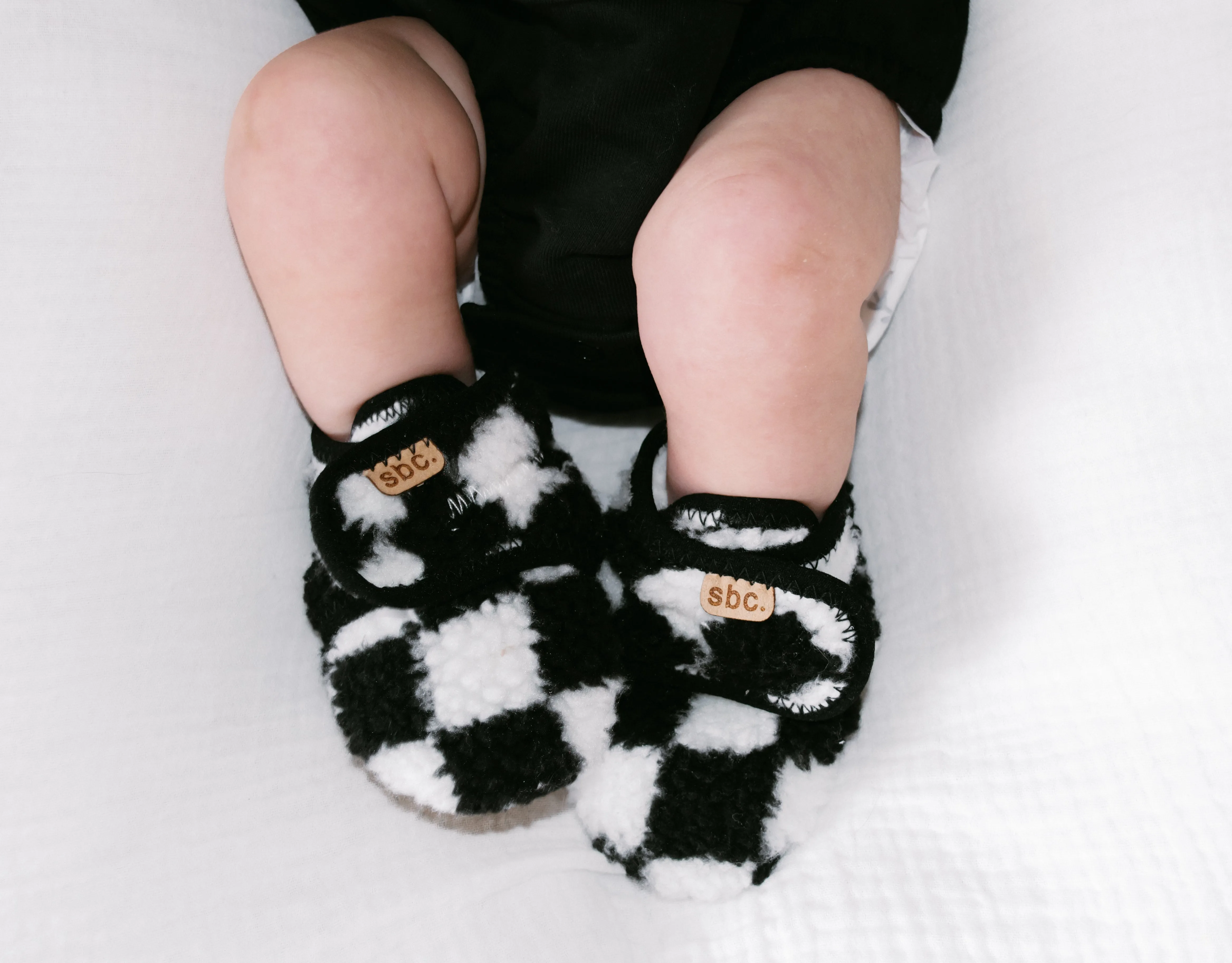 SHORE BABY Sherpa Bootie – Black + White Checkered | Shop Now